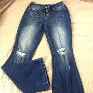 Super flare, distressed, high rise, button-fly jeans